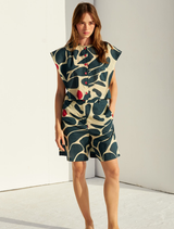 Blue crop shirt with short sleeves, featuring a relaxed fit and a stylish design suitable for casual wear.