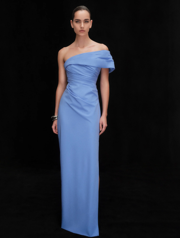 Stunning blue gown showcasing a graceful design, perfect for evening events, with intricate detailing and a flattering fit.