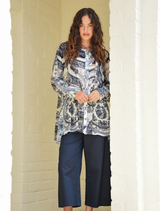 The Best In Show shirt in Blue Plate has a swing bodice, flared panels, and a button-through front for a refined look.