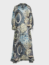 Effortlessly feminine blue dress with cut-out sleeves, adjustable drawstrings, and a stylish V-neckline and collar.
