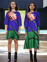 Blue dress featuring a charming tulip print, designed for a clean and sophisticated appearance at any event.