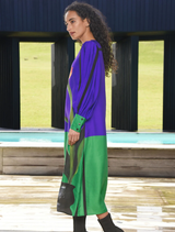 Elegant blue dress adorned with a tulip pattern, showcasing a minimalist style suitable for various events.