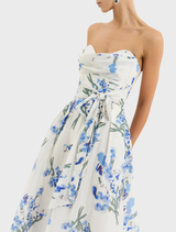 Bluebell Meadow Midi Dress highlighted by a striking floral print, offering a feminine silhouette for various occasions.