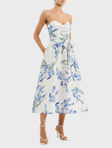 Bluebell Meadow Midi Dress showcasing a beautiful floral pattern, designed for a stylish and comfortable fit in warm weather.