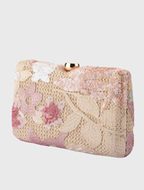 GRETA Floral Clutch showcasing vibrant floral embellishments, secure hardcase, and versatile chain options for evening wear.