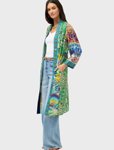 Armeria's patchwork kimono combines diverse patterns and colors, offering a striking and artistic garment.
