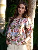 Stylish printed blouse with V neckline and blouson sleeves, featuring a self-tie collar from Loobie's Story's Ceylon collection.