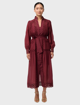 Elegant Bordeaux maxi dress made of cotton silk lace, featuring delicate lace accents and a flowing silhouette.
