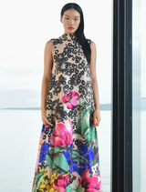 Vintage floral dress with a dip-back, tie detail, and gathered hem for a relaxed fit and soft movement.