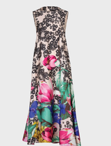Bow Stopper dress in scattered daisies features a dramatic dip-back, tie detail, and gathered hem for soft movement.

