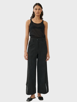 Black Brams pants displayed on a white background, showcasing their sleek design and fabric texture.