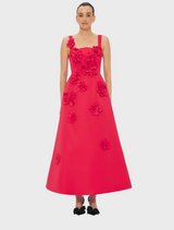 A vibrant red tulle dress, showcasing its delicate and airy fabric.