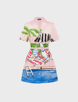 Brigitte Mini Dress showcasing a bright Riviera print, combining elegance and playfulness for summer occasions.
