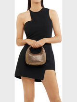 A bronze woven bag set on a white background, showcasing its intricate weave and elegant appearance.