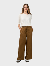 Bronze Polaris Pant laid flat, emphasizing its stylish cut and color, suitable for casual or formal wear.