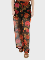 A pair of brown dual trousers laid flat, highlighting the stitching and material quality.