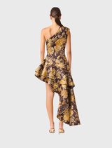 Chic brown and gold floral midi dress with asymmetrical design, one shoulder, and a high-low hem for contemporary elegance.