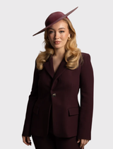 Modern burgundy red hat with minimalist detailing, perfect for race day and crafted for a comfortable fit.