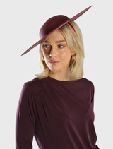 Elegant burgundy racewear hat featuring a structured design and comfortable fitted headband for secure all-day wear.