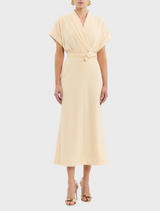 A vibrant yellow dress with a belt and collar, perfect for a chic and fashionable look.