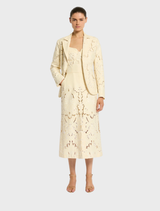 Elegant Colette Dress in a soft Buttermilk shade, showcasing a flattering fit and versatile style for any event.