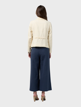 Linen blend jacket in buttermilk with frayed edges, detailed trim, and front and back panel seams for an ideal fit.