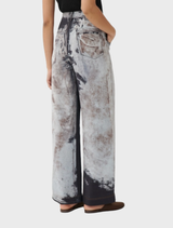 Black and beige Cairo Pant showcasing a two-tone design, ideal for both office and casual wear with refined tailoring.