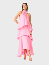 Elegant pink gown with ruffle collar, halter neck, and tiered design, perfect for weddings and formal events.