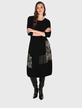 Frank Lyman's camel and black A-line midi dress features animal print, round neck, 3/4 sleeves, and practical pockets.