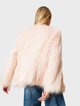 A stylish pink coat hanging, highlighting its modern cut and vibrant color.