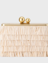 The Carlita Fringe Clutch is a stylish white fringe bag, designed to enhance any ensemble with its natural aesthetic.