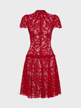 A ruby red A-line dress named Carmen, featuring a fitted bodice and flared skirt, displayed on a mannequin.