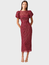 Elegant burgundy dress featuring short sleeves and a sequin finish, perfect for evening wear or festive gatherings.