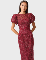 Short-sleeved dress in burgundy, embellished with sequins, providing a glamorous touch for any formal setting.