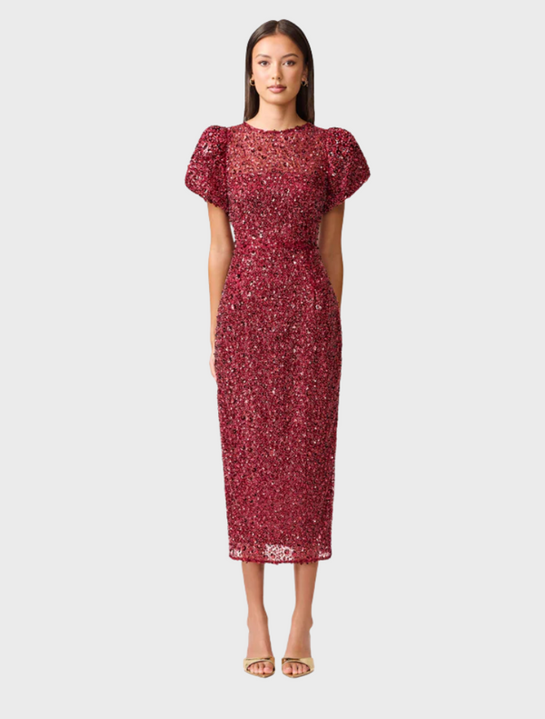  Burgundy sequin dress with short sleeves, showcasing a shimmering and elegant design suitable for formal occasions.