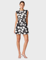Floral dress in black and white, crafted to visually represent a flower with petal-like details and elegant design.