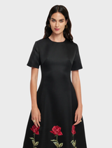 Sophisticated ebony midi dress with rose embellishments, perfect for enhancing your elegance at formal events.