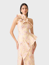 Elegant cream midi dress featuring an asymmetrical neckline, floral jacquard, ruffles, and a front skirt split for movement.