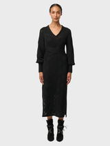 Black knit dress with a V-neckline, made from a comfortable viscose-cotton blend, ideal for versatile styling options.