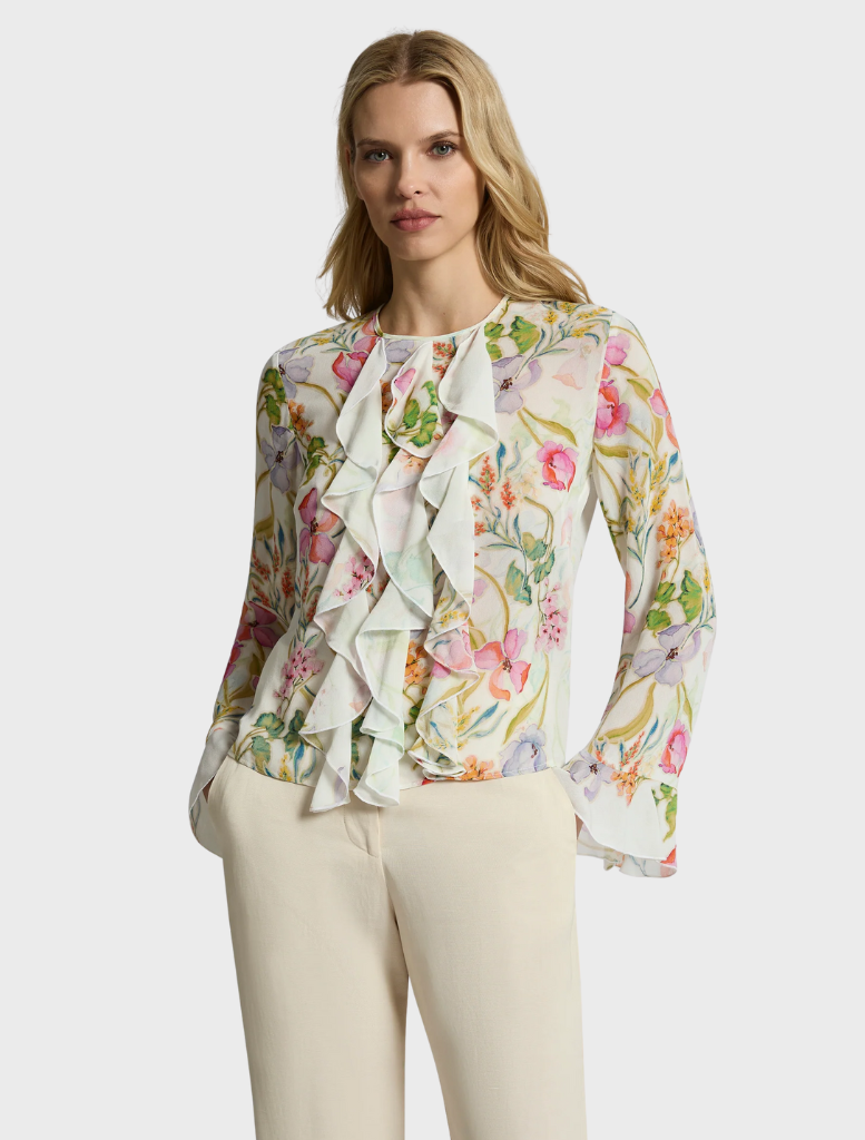 Ivory blouse with a charming floral print, ideal for adding a touch of femininity to any wardrobe.