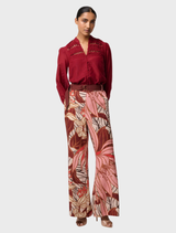 Linen-viscose pants from Adele, designed with a belt and adorned with a striking Cathedral Botanic print.