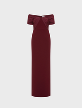 Elegant wine-colored off-the-shoulder gown, featuring a fitted bodice and flowing skirt, perfect for formal occasions.