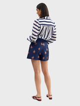 Celina blouse adorned with royal blue and white stripes, offering a fashionable touch to any ensemble.