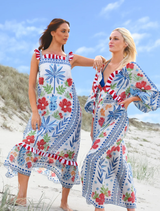 Blue multi-colored dress with a fitted bodice and flared skirt, perfect for making a statement at any event.