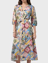 Ceylon Midi Dress showcasing custom embroidery, gathered side hem panels, and a matching tie belt, inspired by Sri Lanka's landscapes.