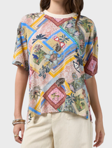 Ceylon Top in multi-color, featuring a rounded neckline, rib trim, and side splits, designed for a flattering fit.