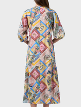 Ceylon Midi Dress with vibrant embroidery, gathered hems, and a tie belt, inspired by the landscapes of Sri Lanka.