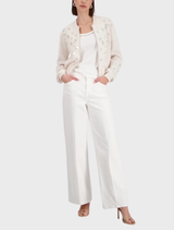 Champagne beige jacket with intricate jewelry detailing, showcasing a stylish and elegant design for formal occasions.