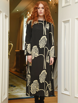Black dress named "Charge It To My Room," featuring a sleek design suitable for various occasions.