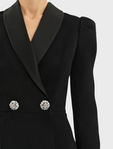 Stunning black Symphony gown with a refined style, featuring a fitted top and a full, flowing skirt.